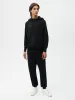 Womens Recycled Cashmere Track Pants—black sold by Pangaia