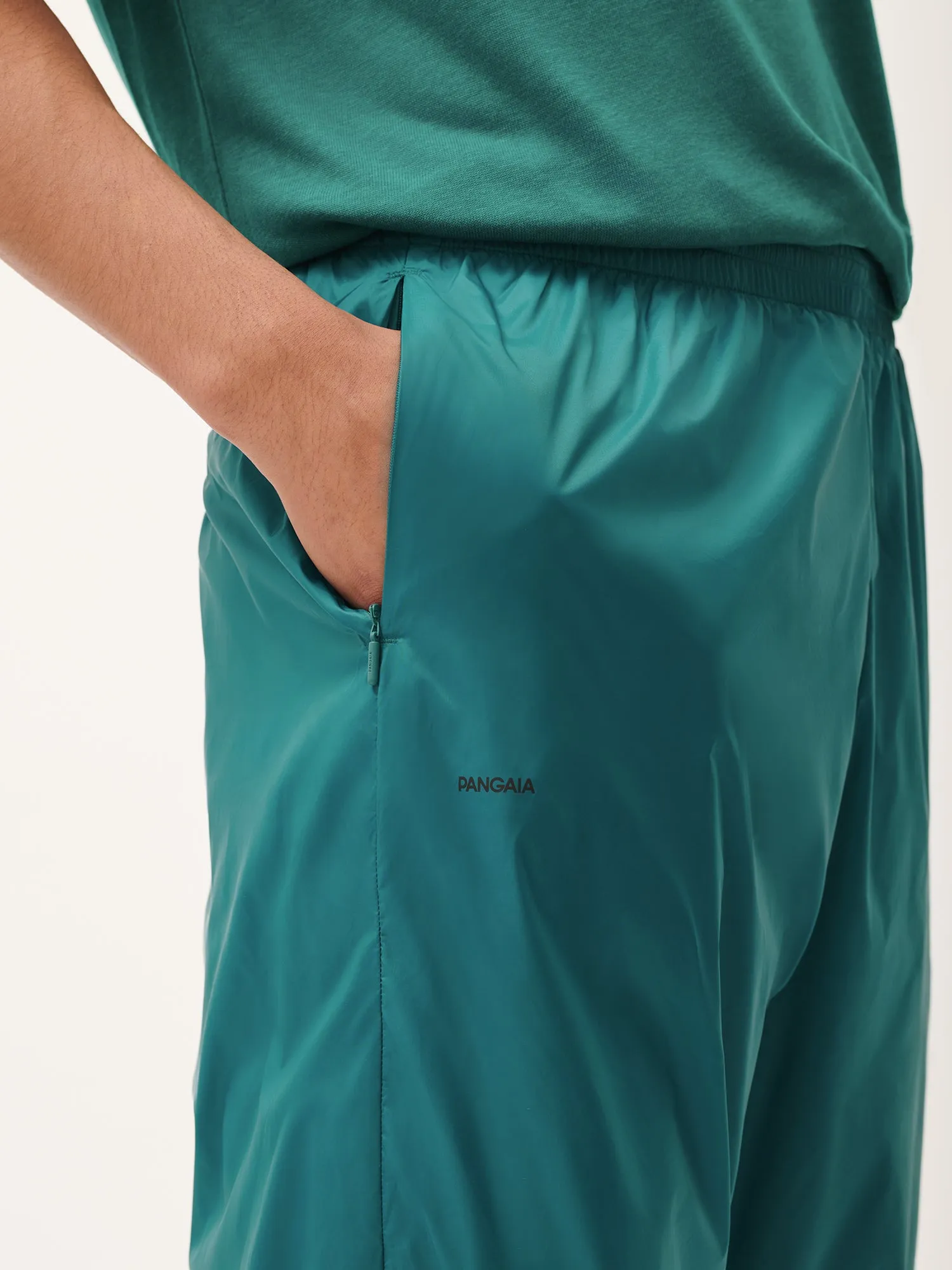 Womens DNA Recycled Nylon Track Pants—scarab teal sold by Pangaia product image thumbnail 4