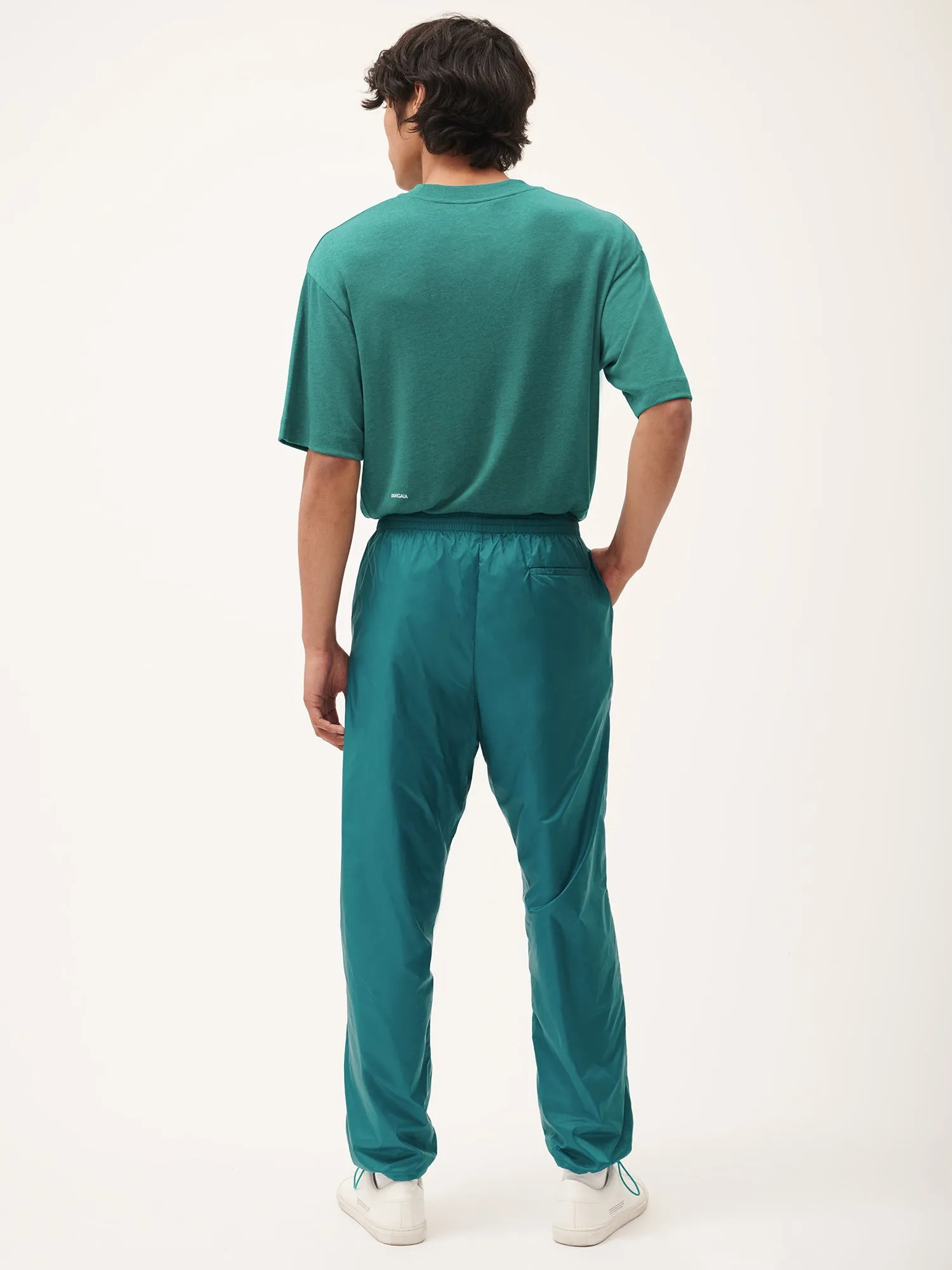 Womens DNA Recycled Nylon Track Pants—scarab teal sold by Pangaia product image thumbnail 3