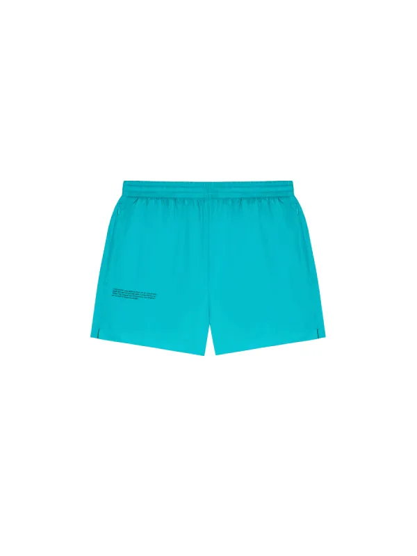 Mens Archive Enhanced Degradation Nylon Shorts—peacock blue sold by Pangaia