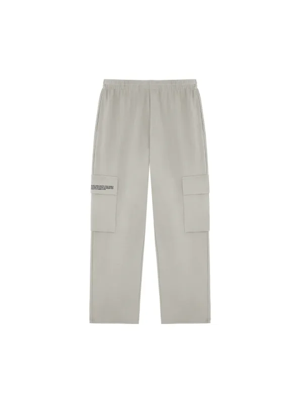 Mens Double Jersey Cargo Track Pants—stone sold by Pangaia