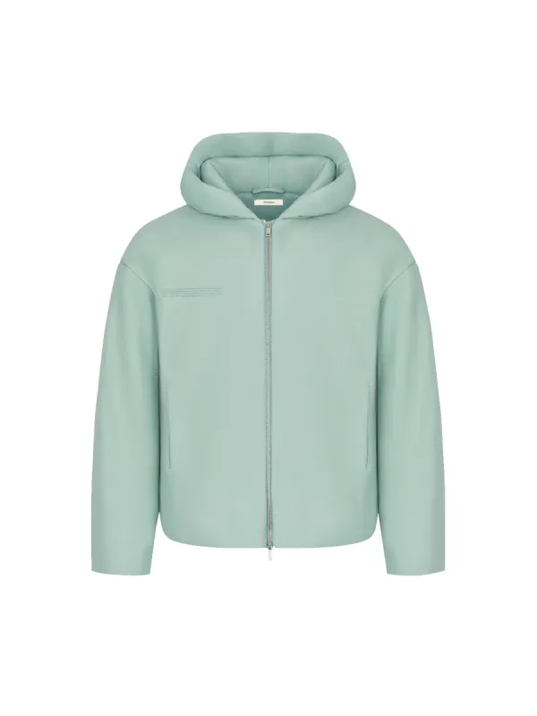 Mens Flower-Warmth Padded Bomber Jacket—Eucalyptus Blue made by Pangaia