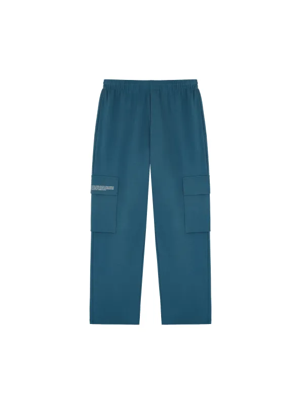 Mens Double Jersey Cargo Track Pants—storm blue sold by Pangaia