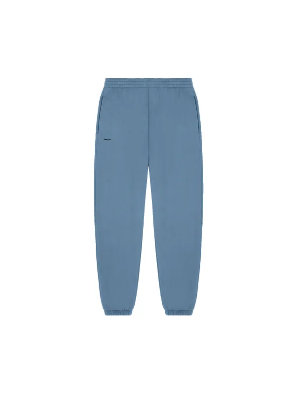 Mens 365 Midweight Track Pants—indigo blue sold by Pangaia