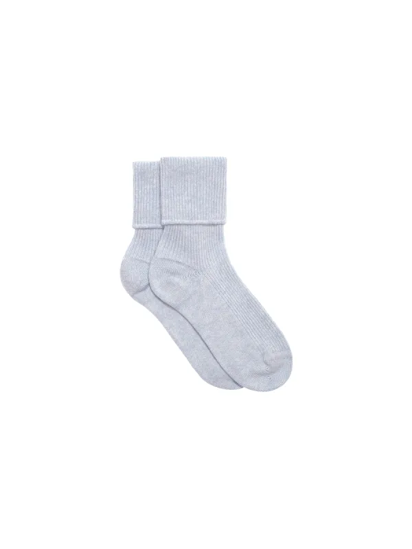 Cashmere Bed Socks—pale blue sold by Pangaia