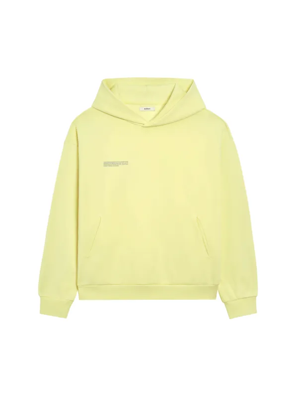 In Conversion Cotton Hoodie—sunbeam yellow sold by Pangaia