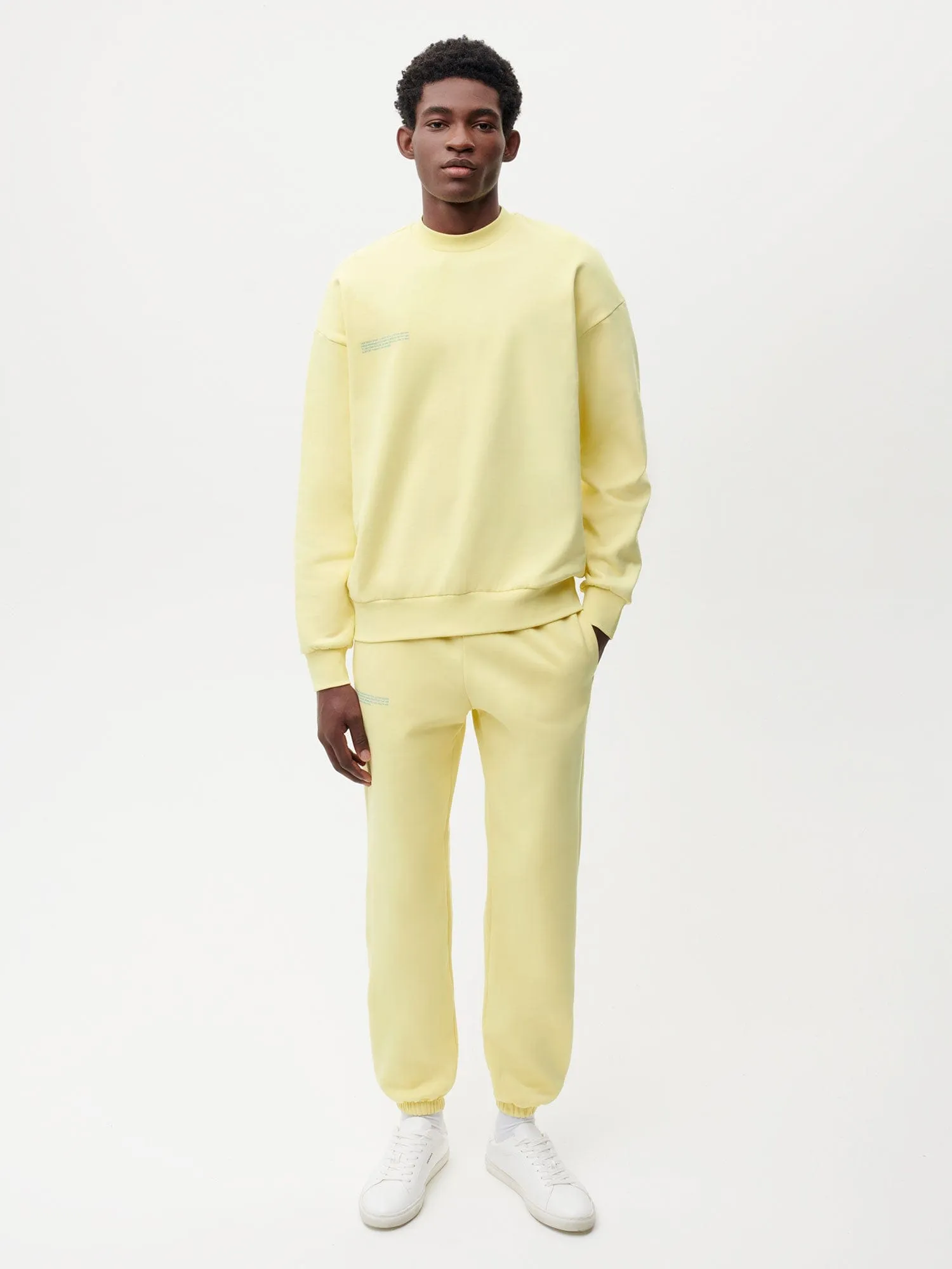 In Conversion Cotton Track Pants—sunbeam yellow sold by Pangaia product image thumbnail 3