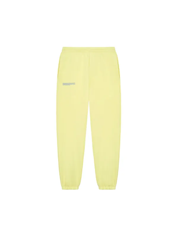 In Conversion Cotton Track Pants—sunbeam yellow sold by Pangaia