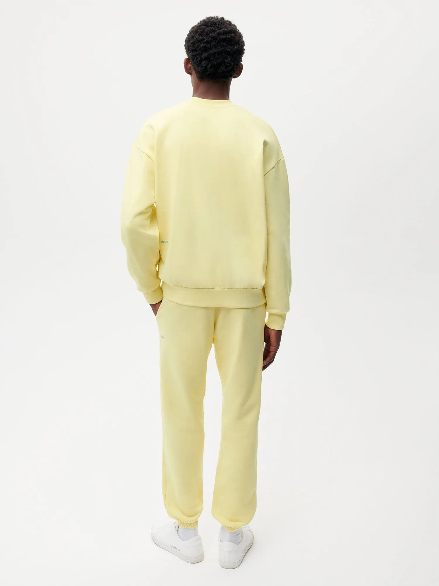 In Conversion Cotton Track Pants—sunbeam yellow sold by Pangaia product image thumbnail 5