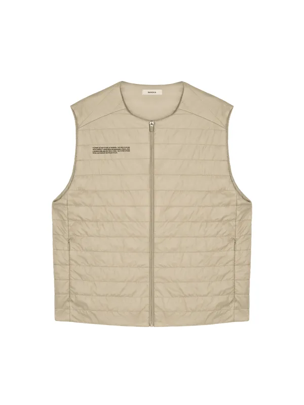 Mens Flower-Warmth Lite Gilet—Wheat Beige sold by Pangaia