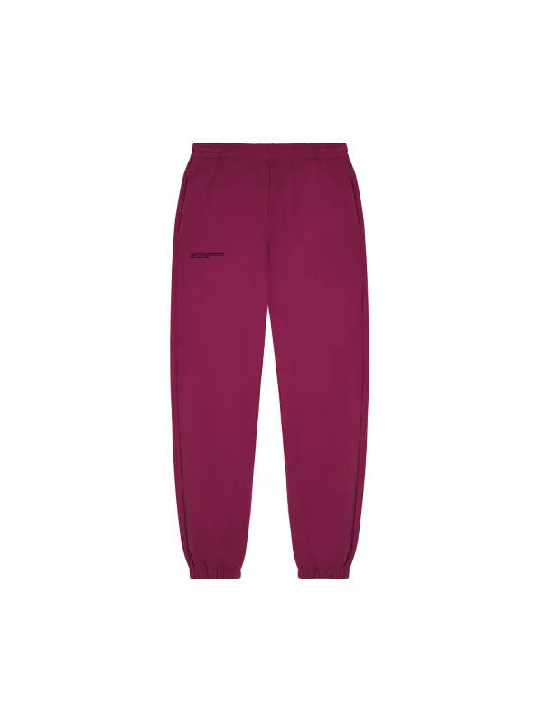 365 Midweight Track Pants—plum purple sold by Pangaia