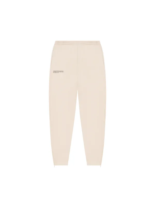Recycled Cotton Tapered Track Pants—sand sold by Pangaia