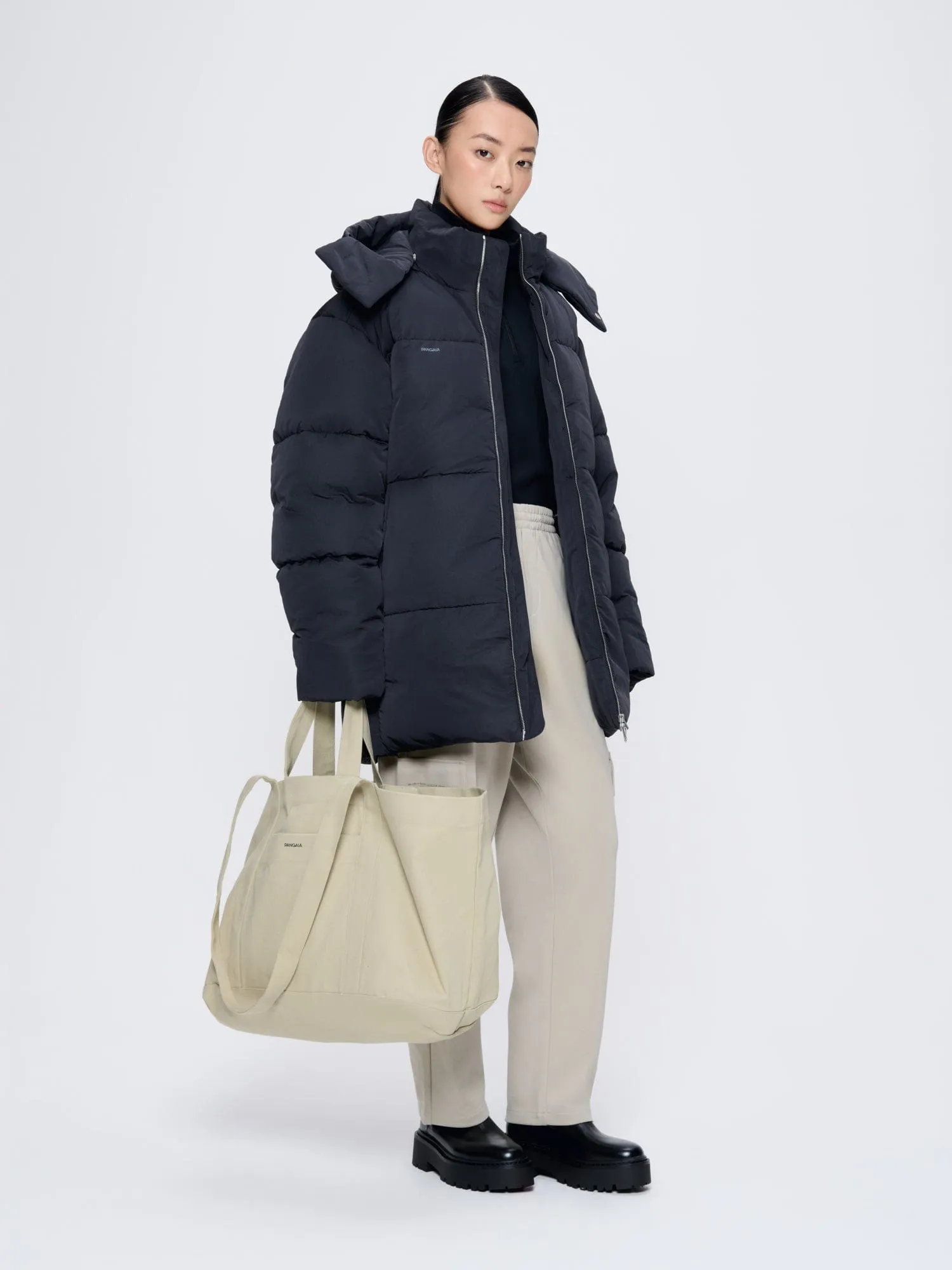 Archive Womens Flower-Warmth Recycled Nylon Long Puffer—black sold by Pangaia