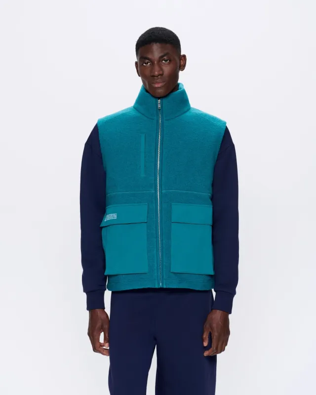 Mens DNA Utility Wool Gilet—scarab teal sold by Pangaia