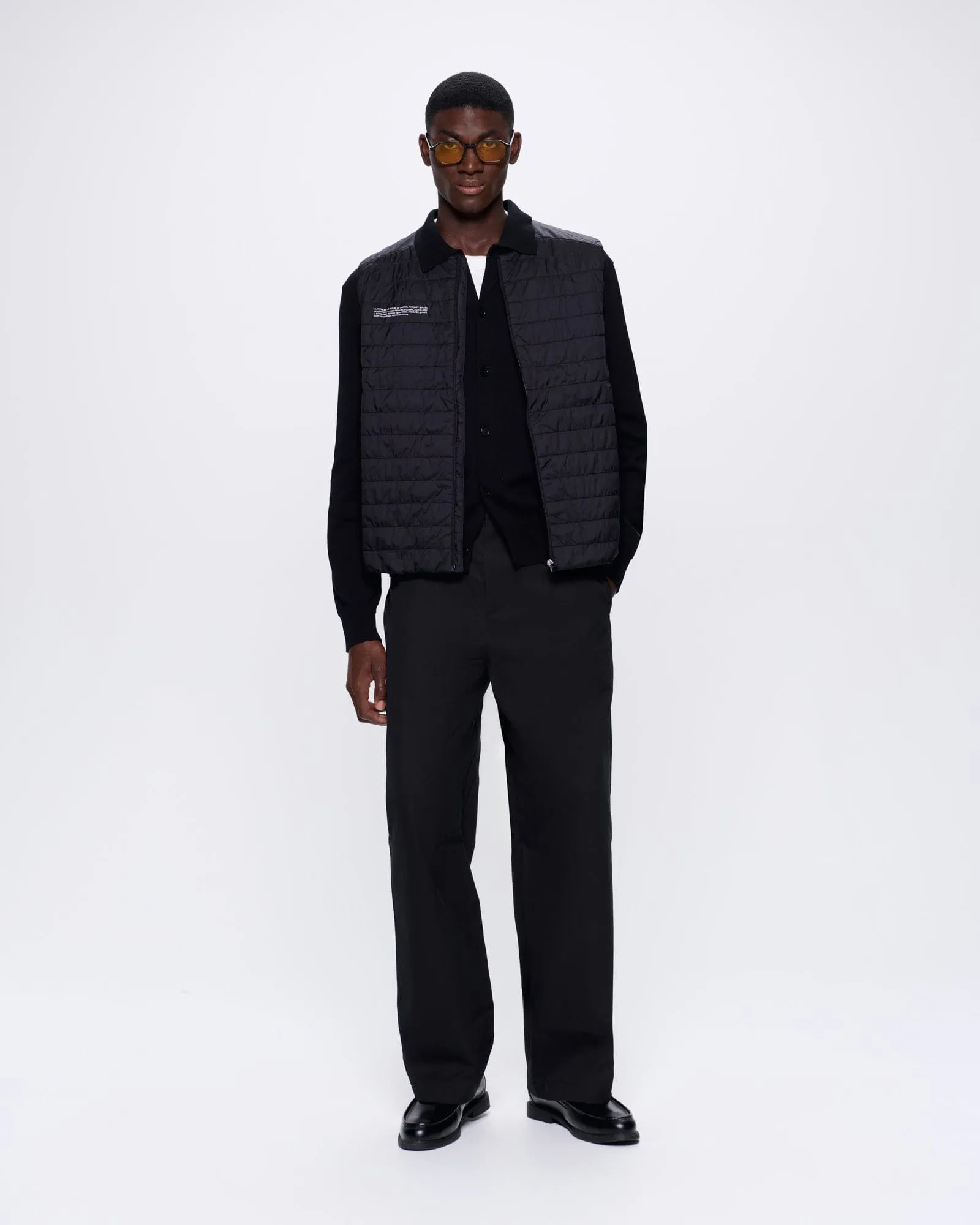 Mens Flower-Warmth Lite Gilet—Black sold by Pangaia