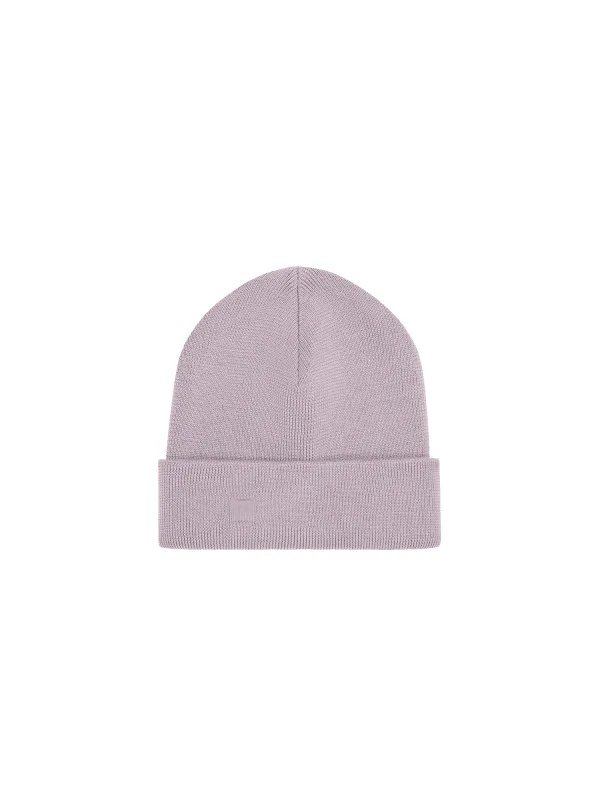 Regenerative Merino Wool Beanie—raisin purple sold by Pangaia
