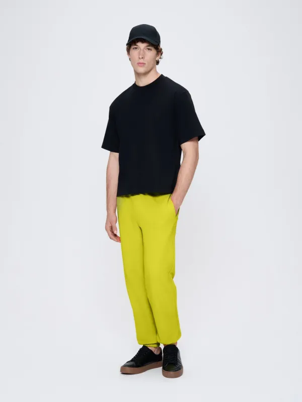 Mens 365 Midweight Track Pants—Auroral Olive sold by Pangaia