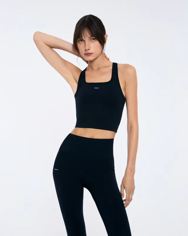 Womens 99% Bio-Based Compressive Ribbed Tank Top—Black sold by Pangaia