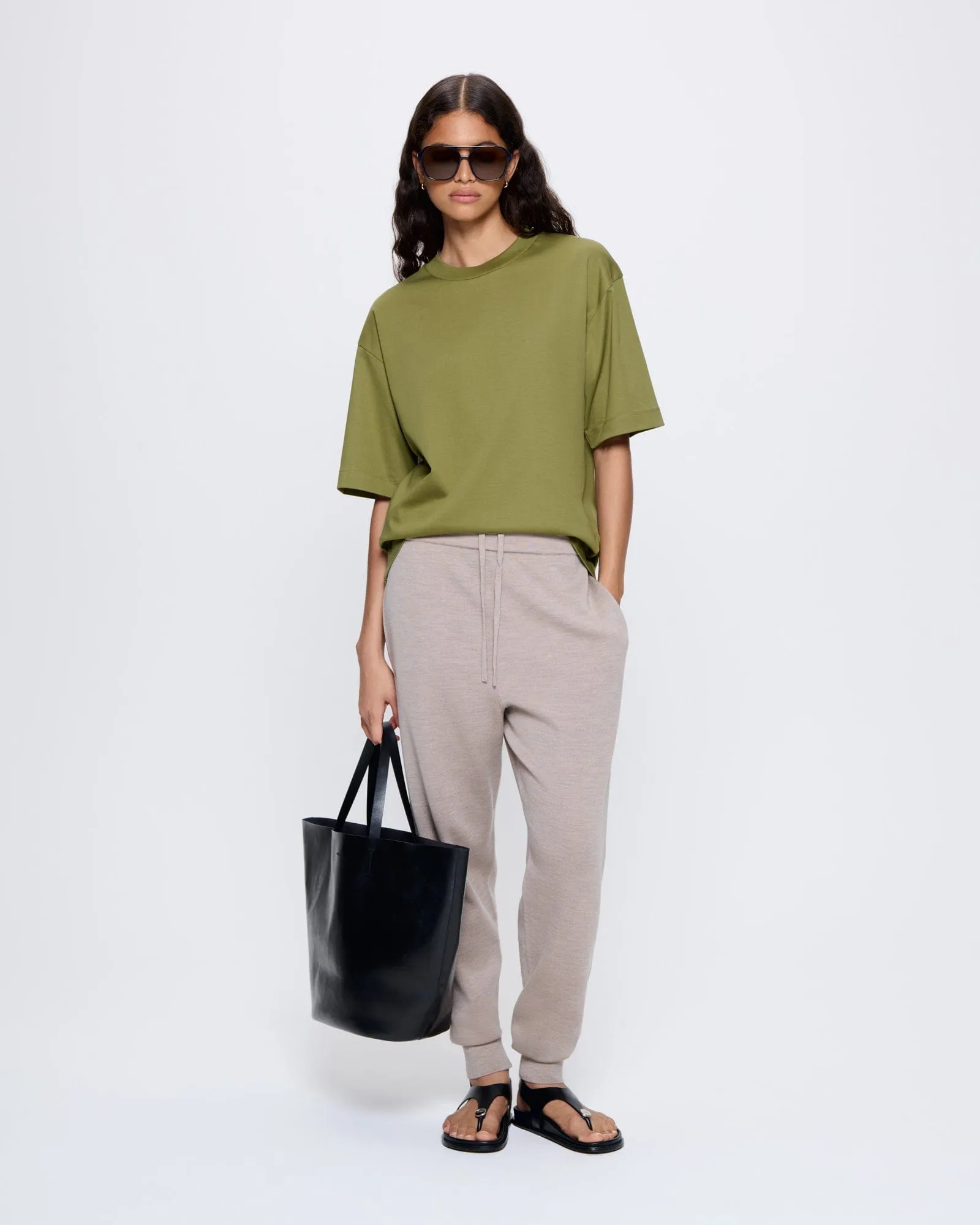 Womens Regenerative Merino Wool Track Pants—stone marl sold by Pangaia