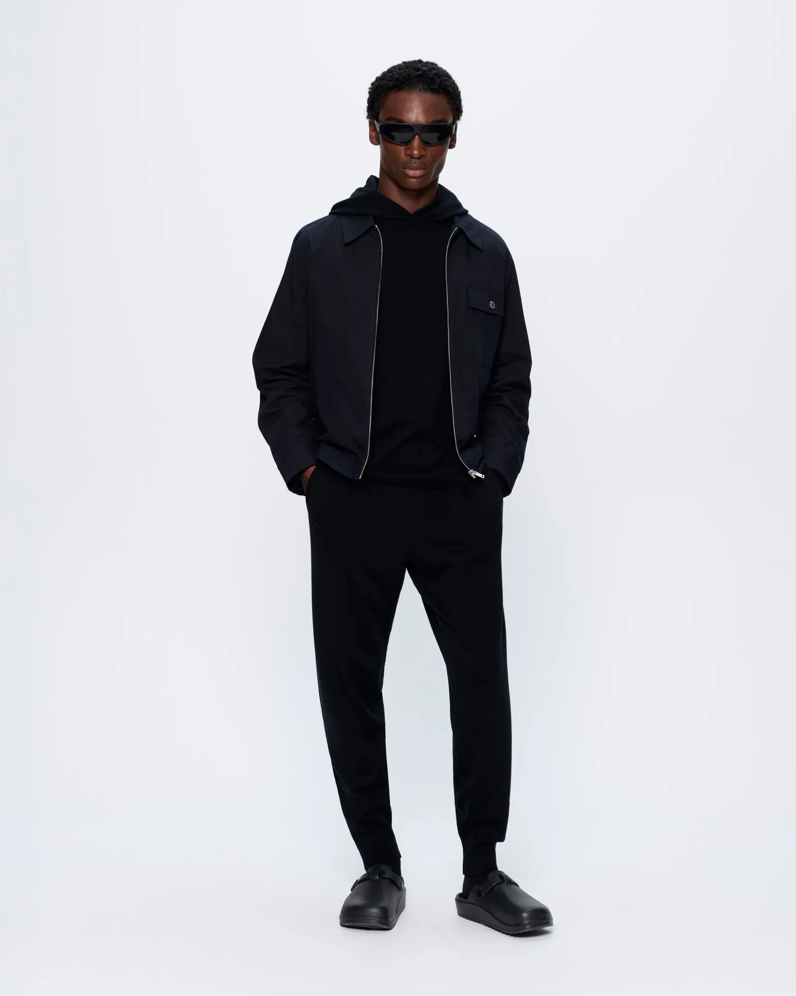 Mens Regenerative Merino Wool Track Pants—black sold by Pangaia