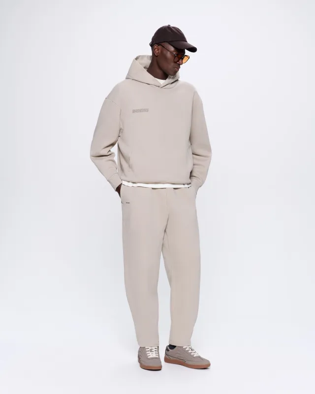 Archive Mens DNA Barrel-Leg Track Pants—stone sold by Pangaia