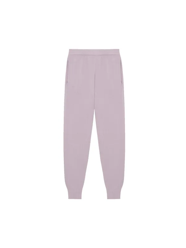 Mens Regenerative Merino Wool Track Pants—raisin purple sold by Pangaia