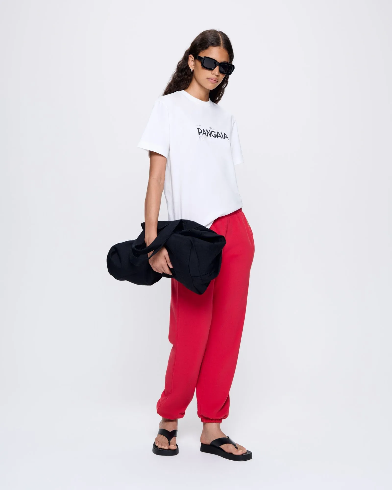 Womens 365 Midweight Track Pants—Goji red sold by Pangaia