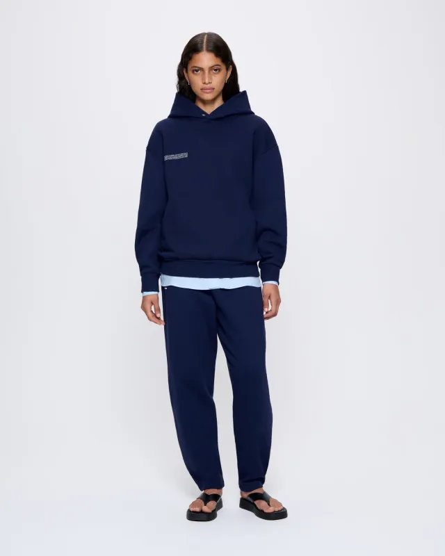 Womens DNA Barrel-Leg Track Pants—navy sold by Pangaia