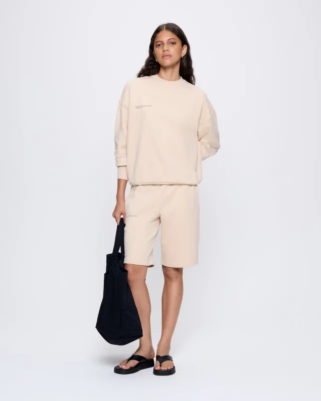 Womens 365 Midweight Long Shorts—sand sold by Pangaia