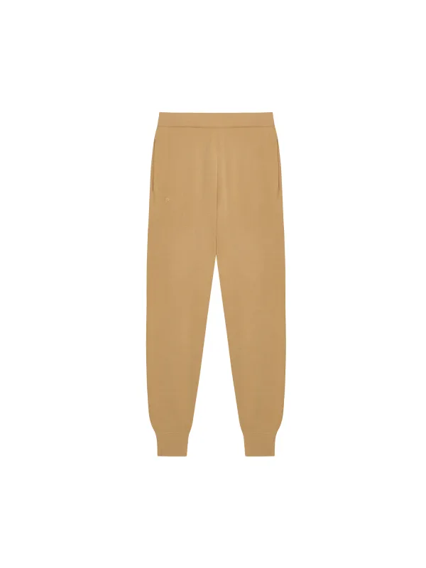 Womens Regenerative Merino Wool Track Pants—camel sold by Pangaia