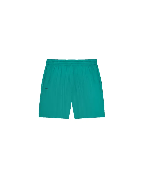 Womens DNA Recycled Nylon Shorts—scarab teal sold by Pangaia