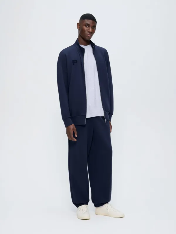 Mens Track Pants—Midnight Navy made by Pangaia