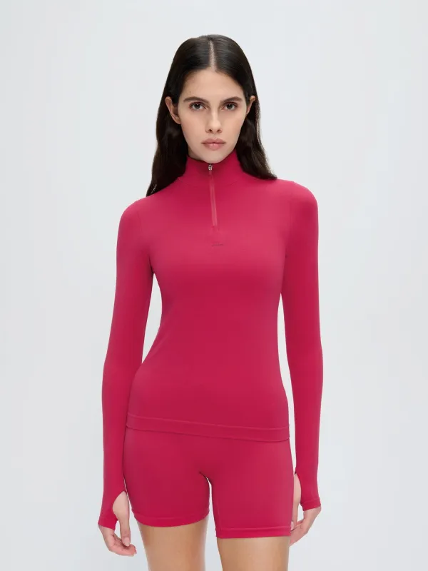 Womens 99% Bio-Based Zipped Long Sleeve Top—Acai Pink sold by Pangaia