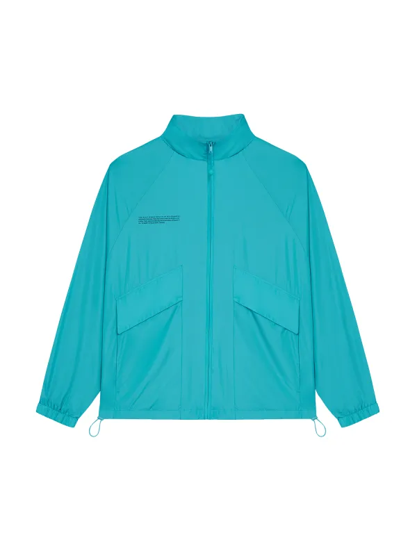 Womens Nylon Jacket—peacock blue made by Pangaia