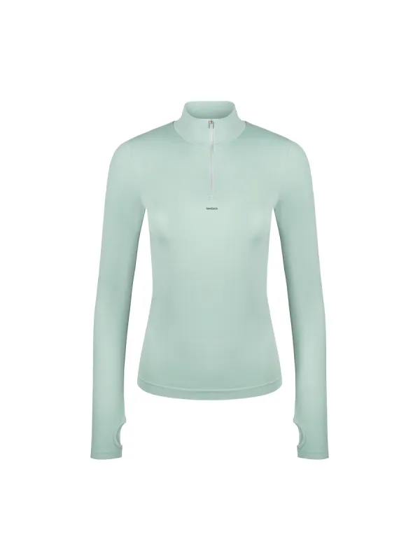 Womens Plant-Stretch Zipped Long Sleeve Top—Eucalyptus Blue sold by Pangaia