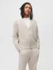 Womens Recycled Cashmere Cardigan—oatmeal sold by Pangaia