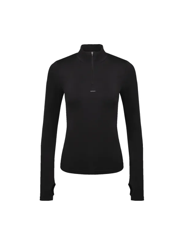 Womens 99% Bio-Based Zipped Long Sleeve Top—Black sold by Pangaia