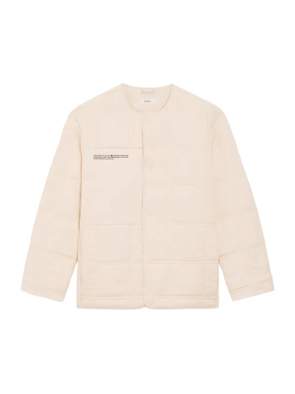 Womens Flower-Warmth Quilted Collarless Jacket—sand sold by Pangaia