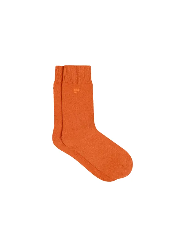 Recycled Cashmere Socks—cinnamon orange sold by Pangaia