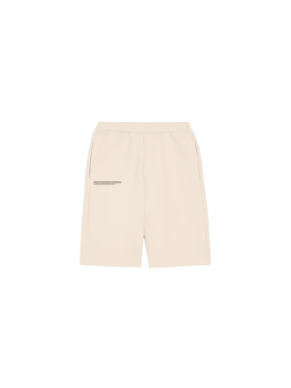 Womens 365 Midweight Long Shorts—sand sold by Pangaia