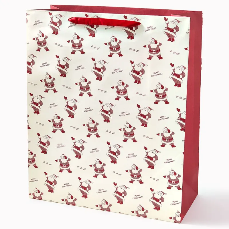 Newsprint Santa XL Gift Bag sold by Paper Source