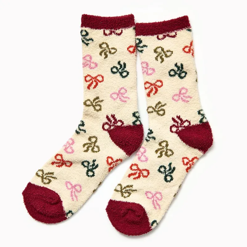 Fuzzy Bow Socks sold by Paper Source