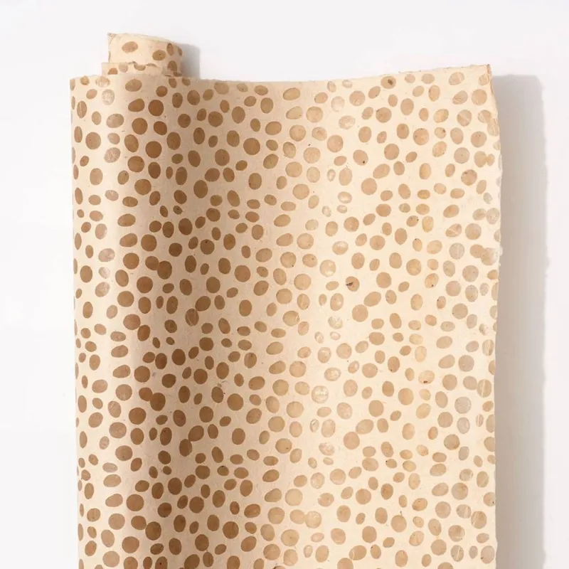 Translucent Pebbles on Cream Handmade Paper sold by Paper Source