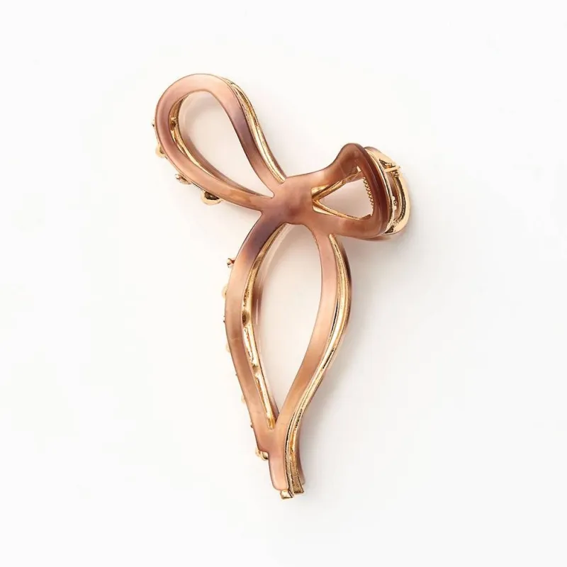 Tortoise Bow Hair Clip sold by Paper Source