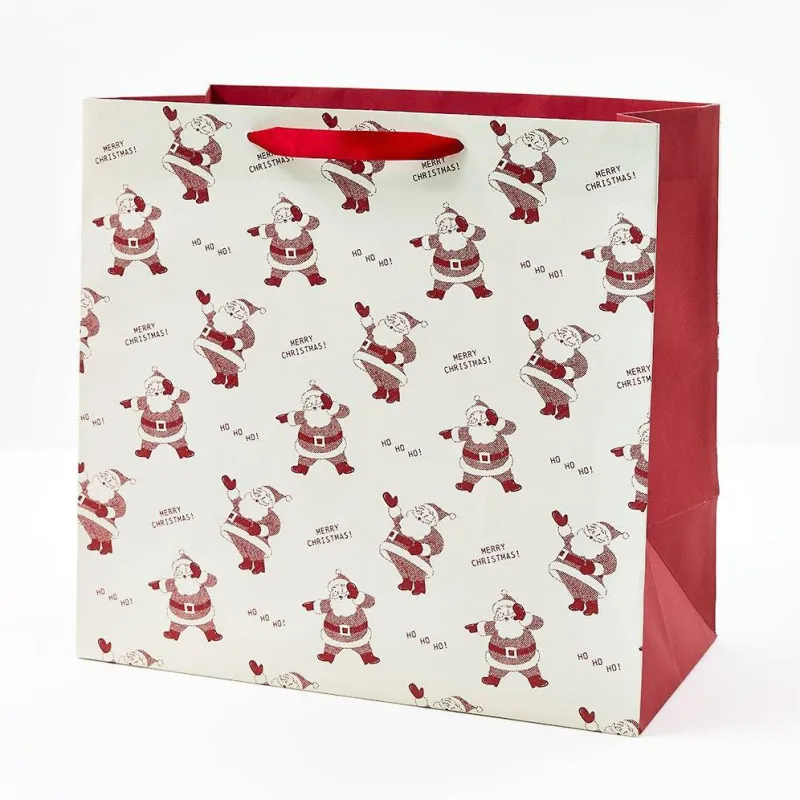 Newsprint Santas Large Gift Bag sold by Paper Source