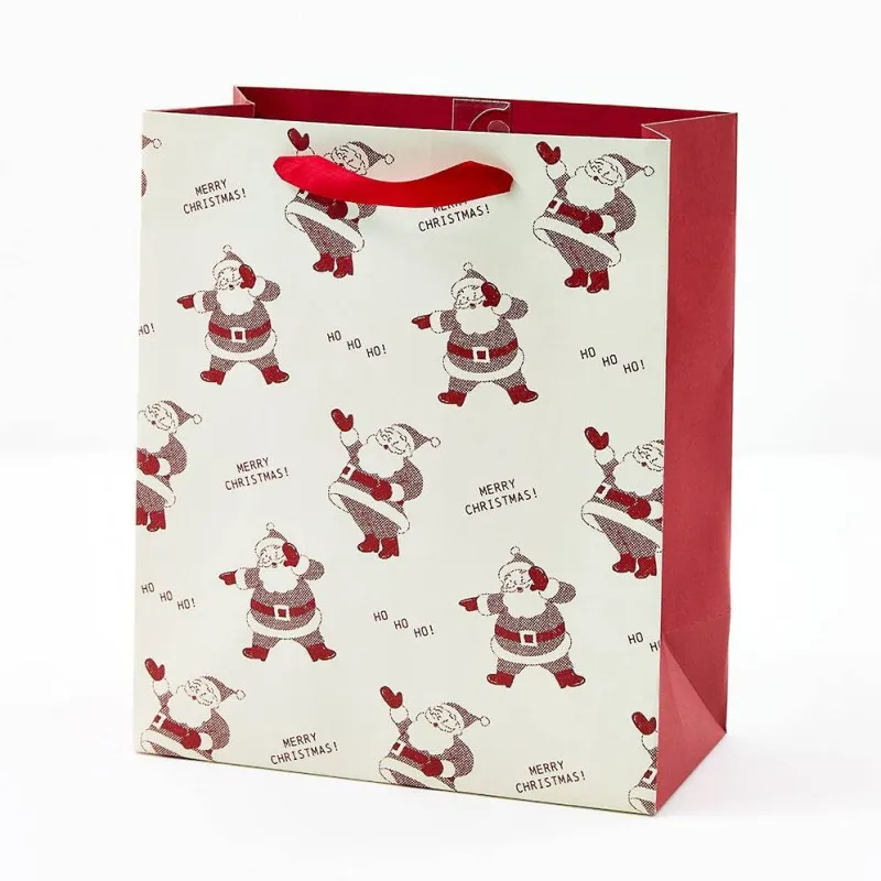 Newsprint Santas Medium Gift Bag sold by Paper Source