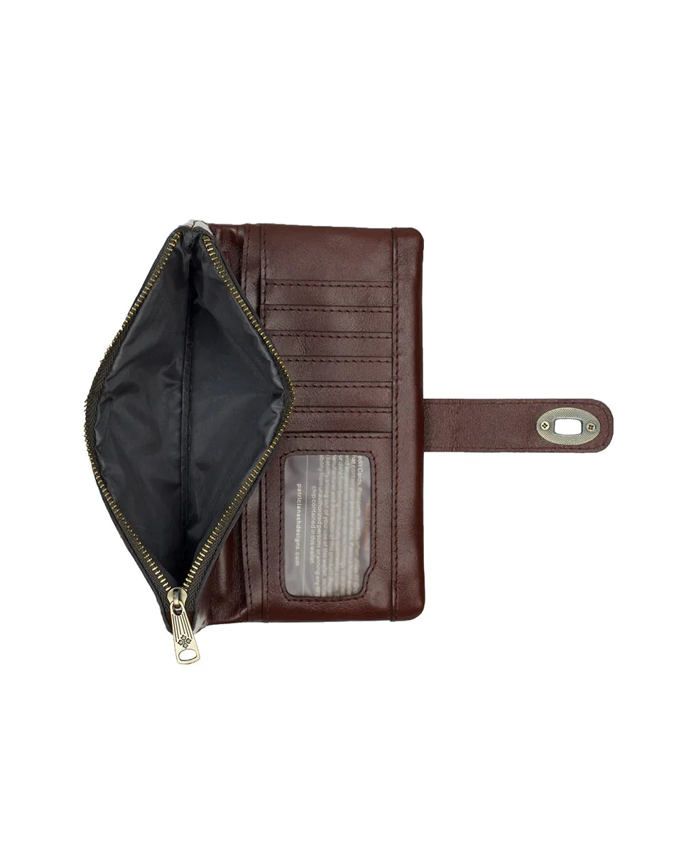 Annesley Wristlet | Brazilian Supple Tooled | Cognac sold by Patricia Nash product image thumbnail 4