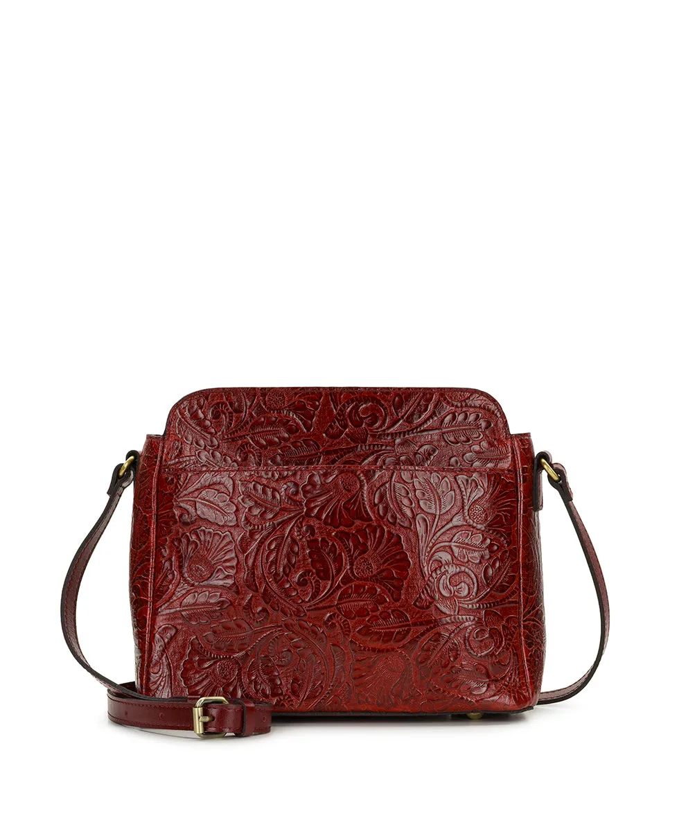 Ithaca Crossbody | Brazilian Supple Tooled | Red sold by Patricia Nash