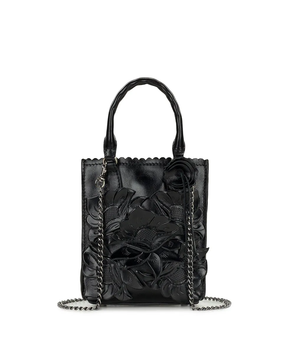 Noella Tote Crossbody | Cavo Tooled Applique | Distressed Black sold by Patricia Nash