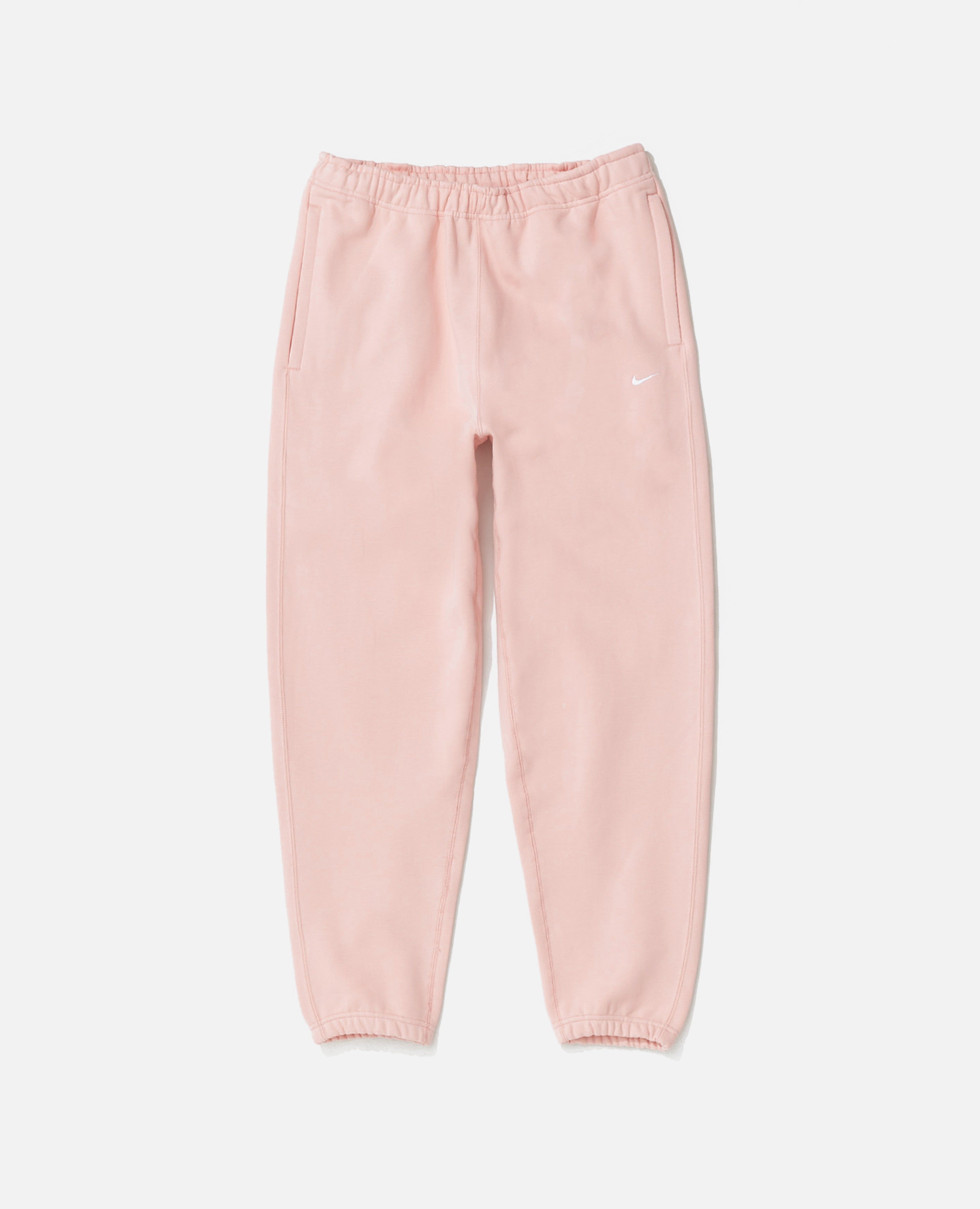 Nike NRG Solo Swoosh Fleece Pants (Bleached Coral/White) sold by Patta